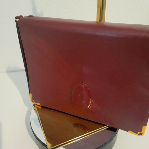 Cartier Accessories - PRISTINE CARTIER CLUTCH WRISTLET Authentic